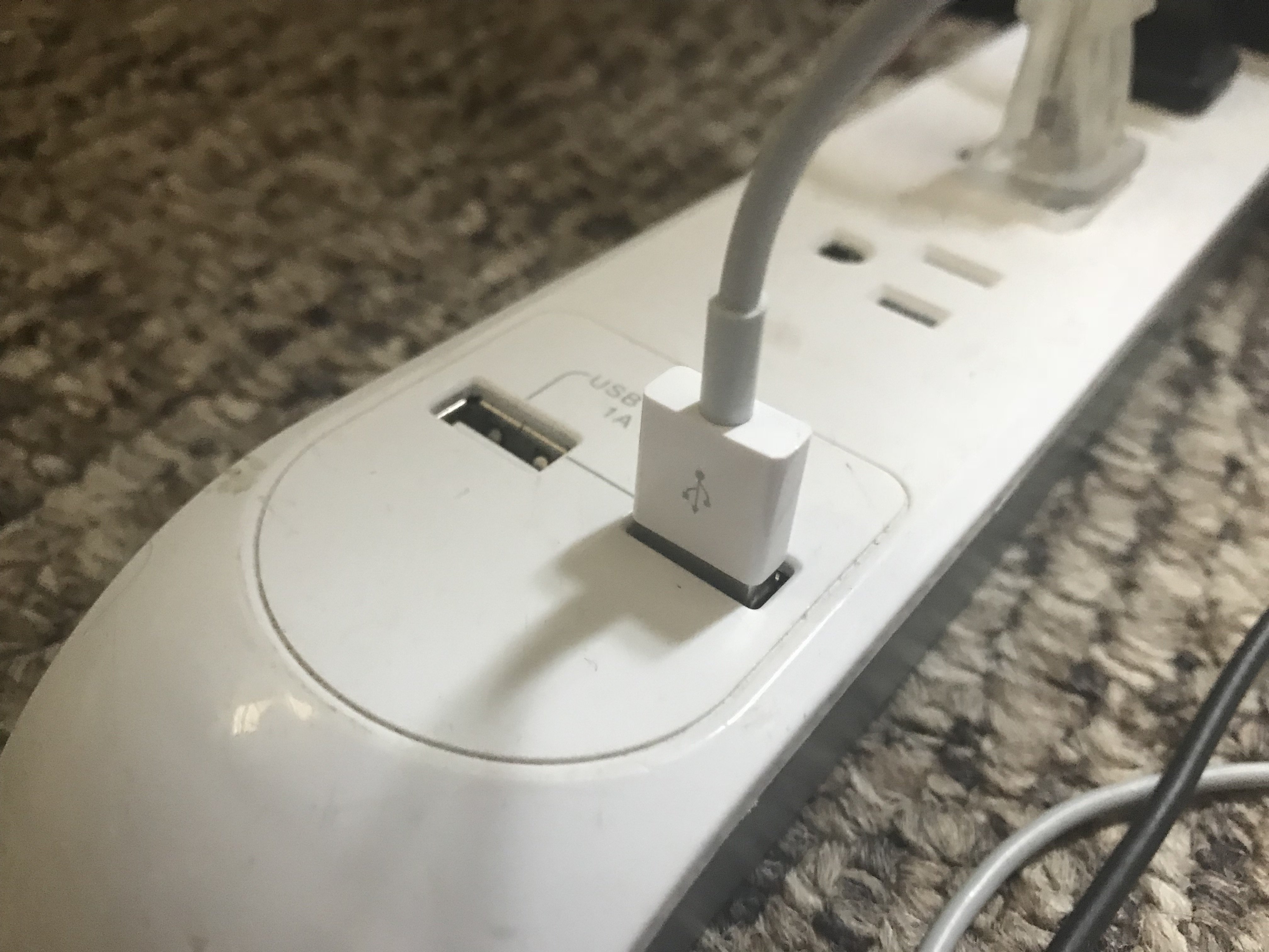 iPhone plugged into usb port
