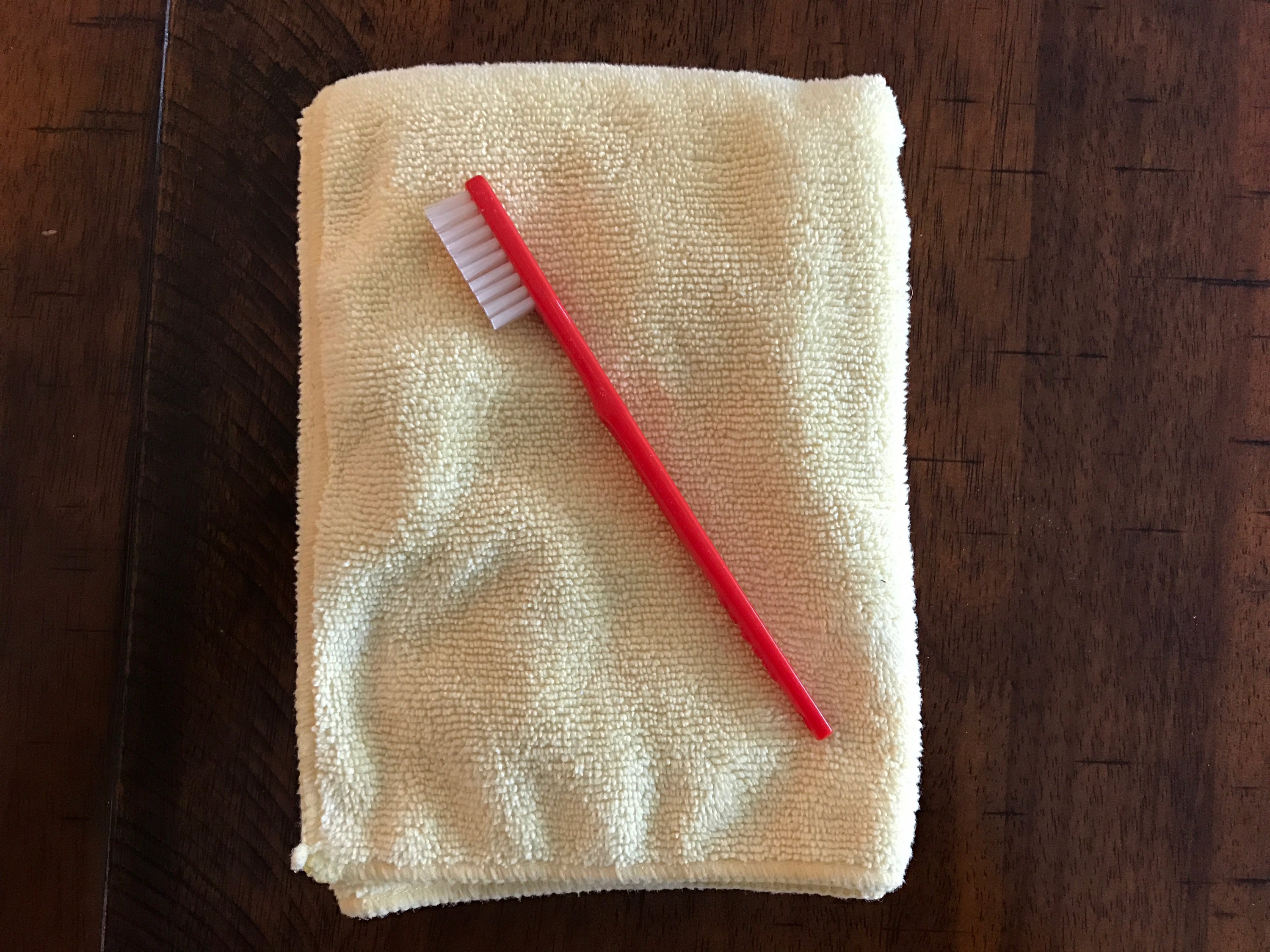 microfiber cloth and toothbrush