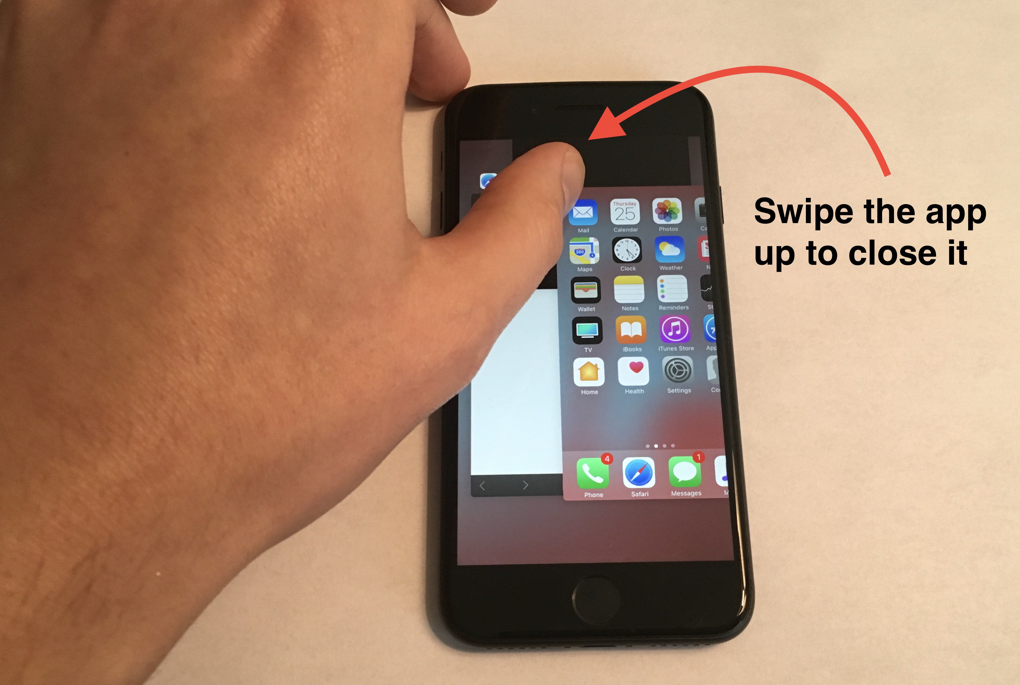 swipe up on app to close it from app switcher