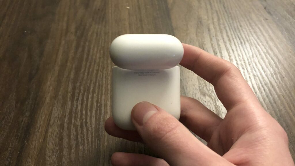 Press AirPods Charging Case Button